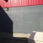 La peinture de murs rehausse l'aspect du bâtiment et facilite son entretien.